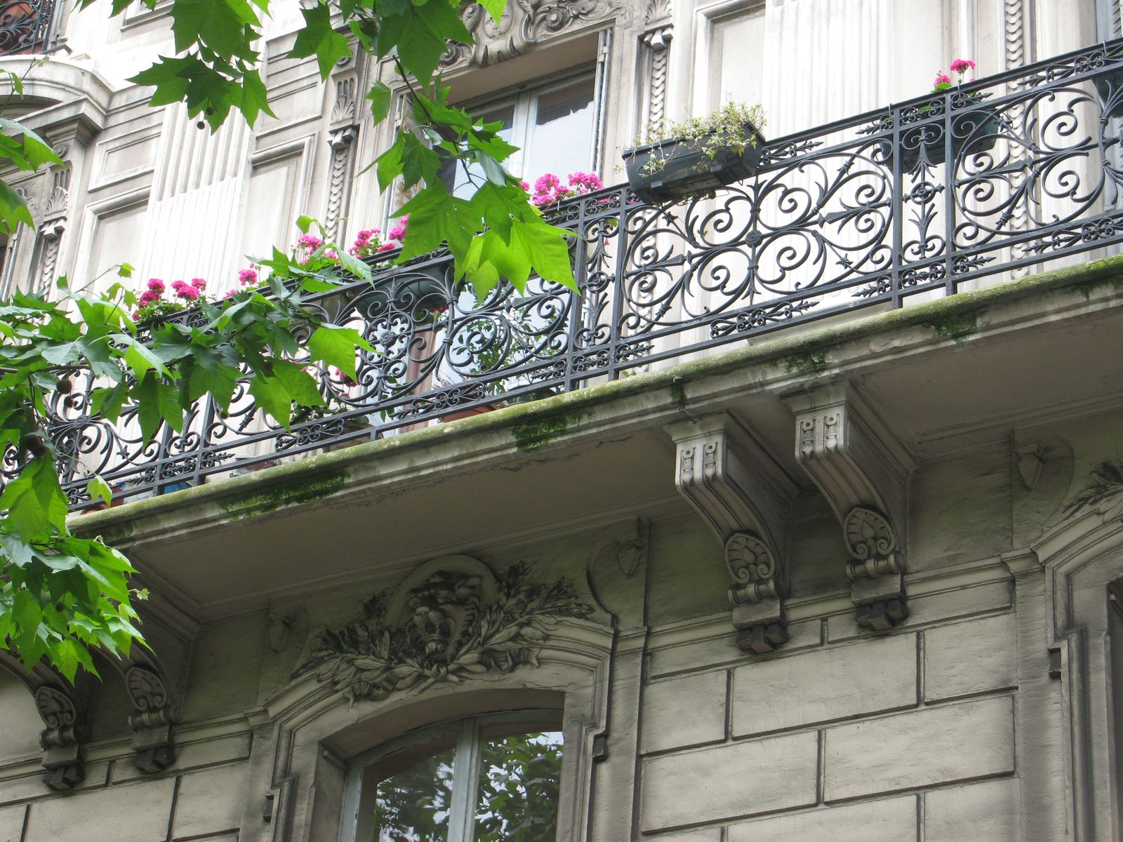 Wrought-iron balcony with flowers
