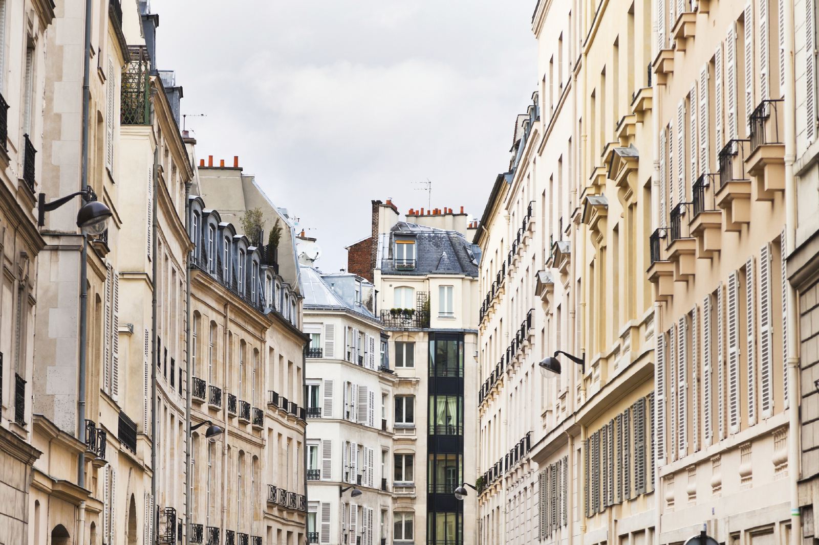 Parisian street lined with Haussmann buildings